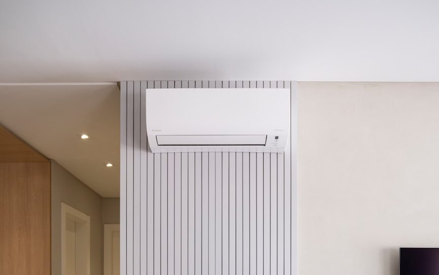 Modern living room with air conditioner and decor